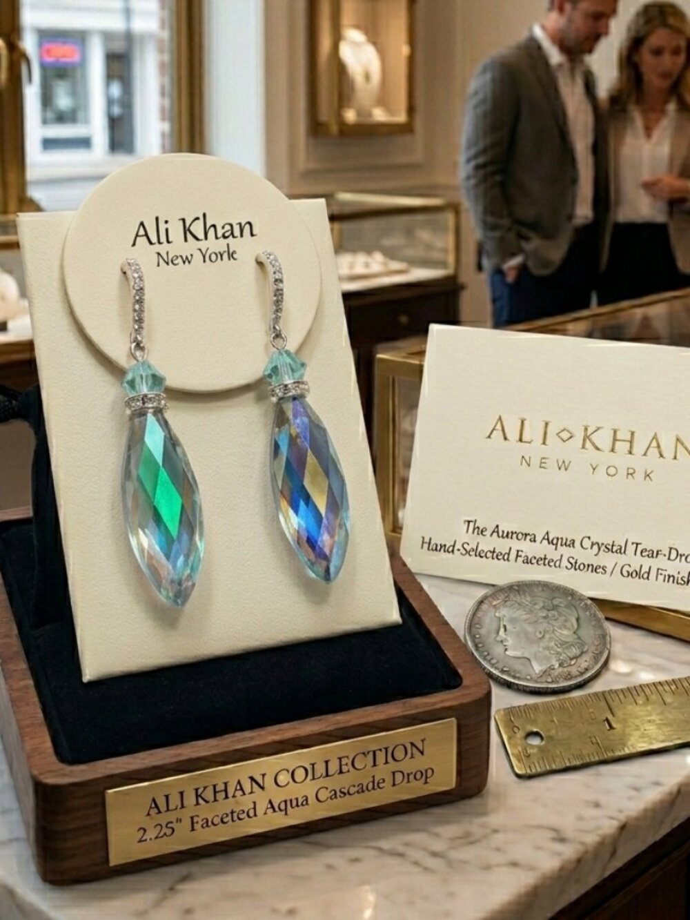Ali Khan faceted, marquise-shaped "Aqua" crystal  silver tone earring